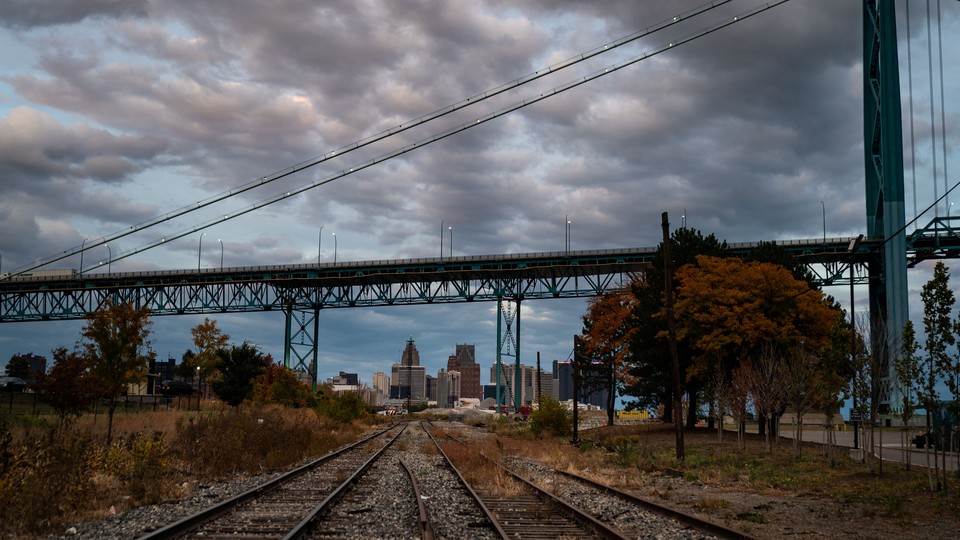 The Detroit skyline seen from empty train tracks