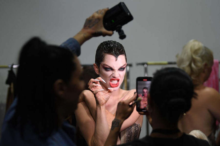 A model poses, making a fierce face.