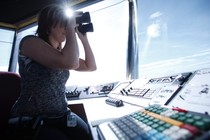 An Air Traffic Control specialist watches plane traffic from the control tower at the Ogden-Hinckley Airport in Ogden, Utah