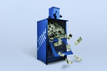 a newspaper-dispenser box full of money