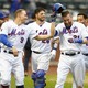 The New York Mets third baseman Todd Frazier celebrates with teammates in a game against the Marlins on September 13, 2018.