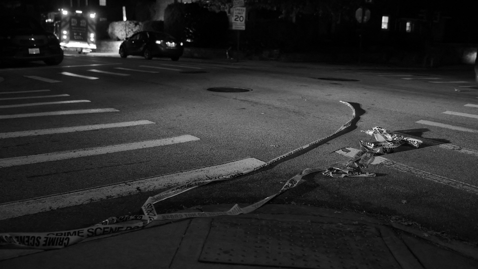 A photo showing police tape on the ground