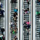 shoppers on an escalator