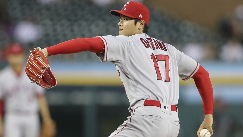 Los Angeles Angels pinch hitter Shohei Ohtani wears a jersey with his  nickname SHOWTIME on the back as he bats in the eighth inning during the  Major League Baseball game against the