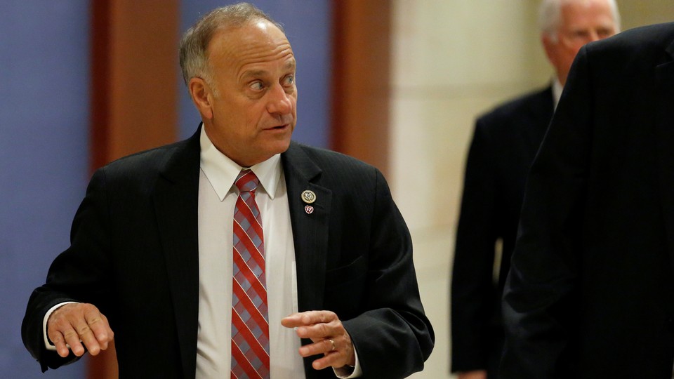 Representative Steve King of Iowa looks into the distance before entering a meeting at the Capitol.