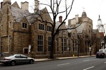 The outside of a stately stone building