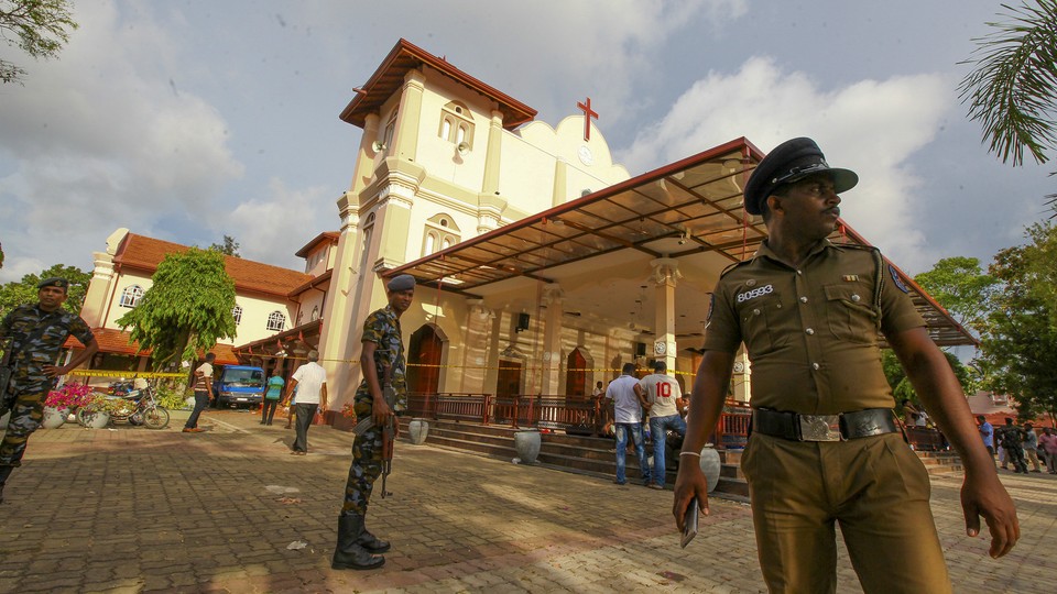 Sri Lankan army soldiers secure the area around St. Sebastian's Church in Negombo, north of Colombo.