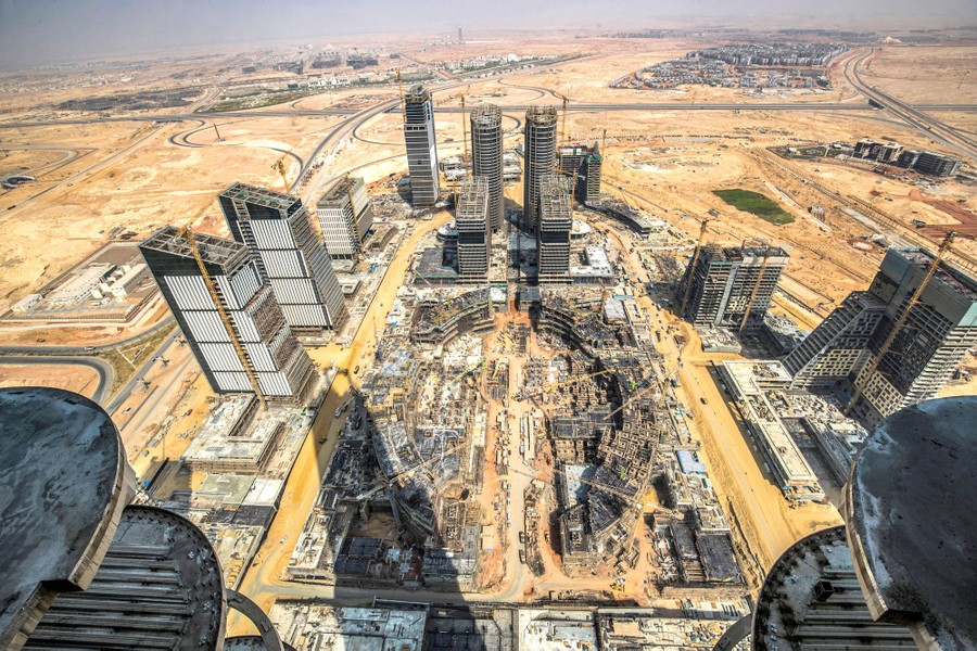 An elevated view of a number of tall buildings under construction