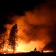 A firefighter battles the Ponderosa Fire east of Oroville, California, in late August. 