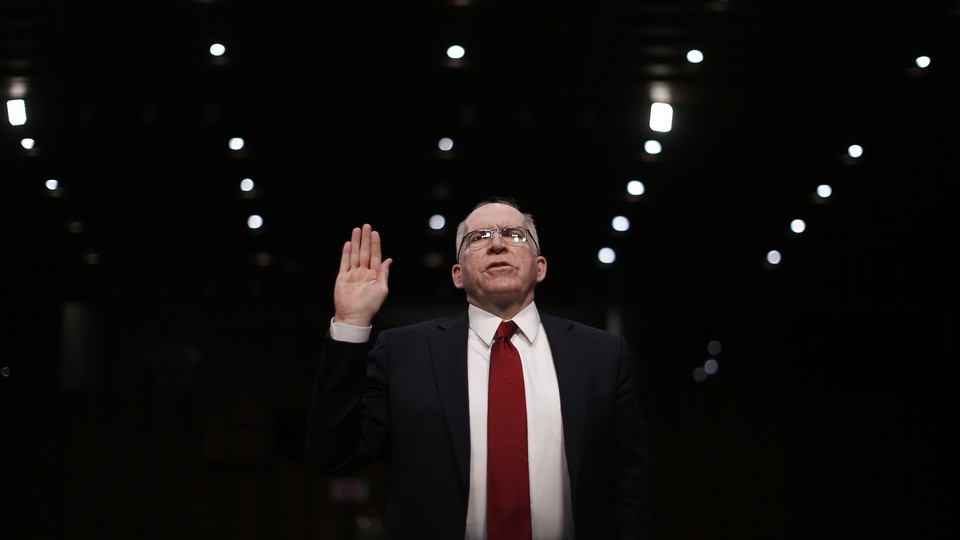 John Brennan is sworn in to testify before a Senate Intelligence Committee hearing on his nomination to be the director of the CIA in 2013.