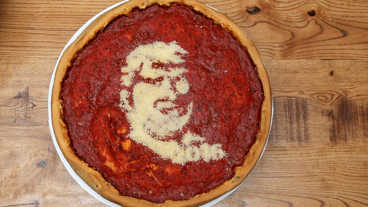 A pizza with Donald Trump's face on it