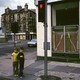 photo of two young boys standing on a street corner in Glasgow
