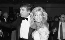 A black-and-white photograph of Donald and Ivana Trump in 1989