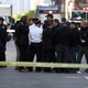 Police stand outside of the Time Warner building after a suspicious package was found inside CNN Headquarters