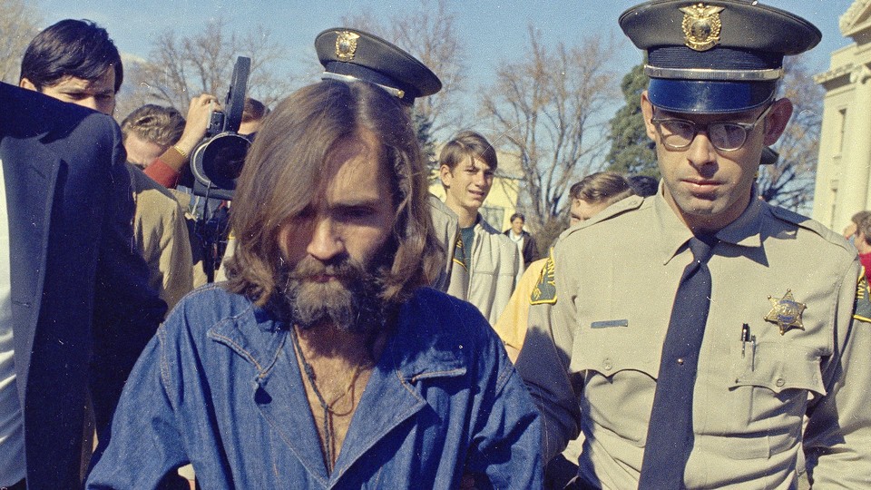 Charles Manson in handcuffs in 1970