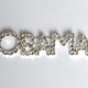 A rhinestone pin spelling out "OBAMA"