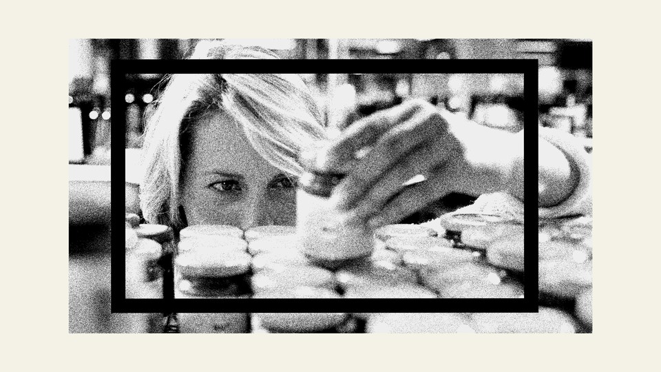 A woman stocking grocery shelves