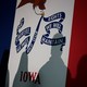 Shadows are seen on an Iowa flag during an event with Republican presidential candidate Florida Governor Ron DeSantis.