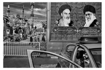A mural on an exterior city wall in Iran shows Ayatollahs Khomeini and Khamenei.