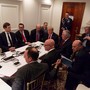 U.S. President Donald Trump is shown in an official White House handout image meeting with his National Security team.
