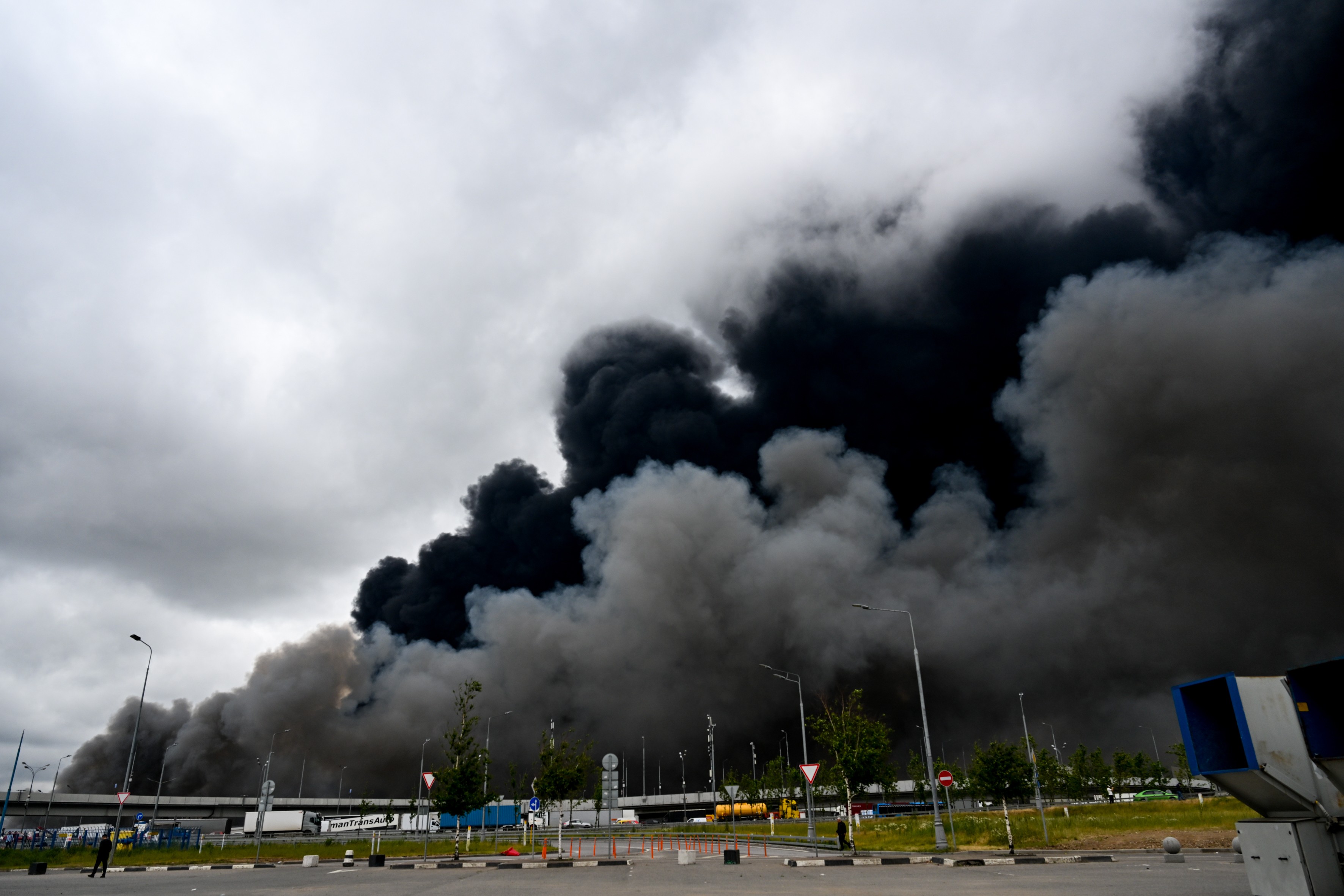 Black smoke rises from a refinery in Moscow following Ukrainian missile and drone strikes.