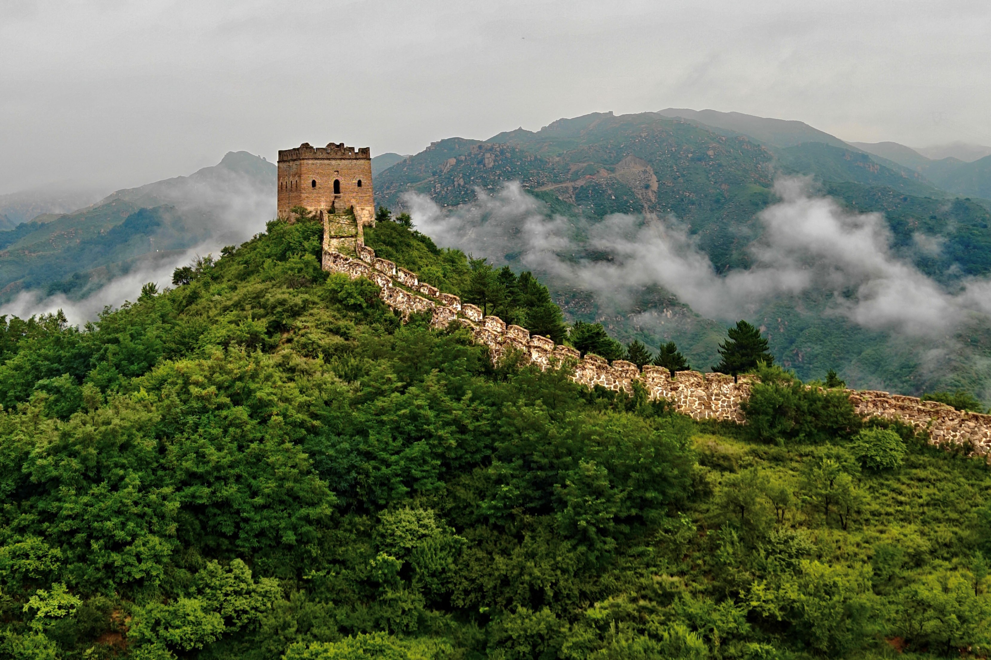 A section of the Great Wall of China, seen on a hilltop