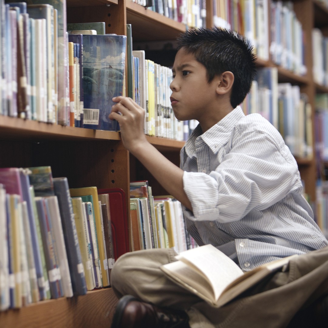 students reading books in library