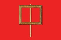 a protest sign made from an art frame