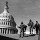 Security personnel near the Capitol dome