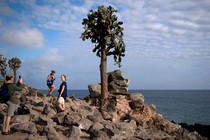 Photograph of tourists taking pictures on the Galápagos Islands