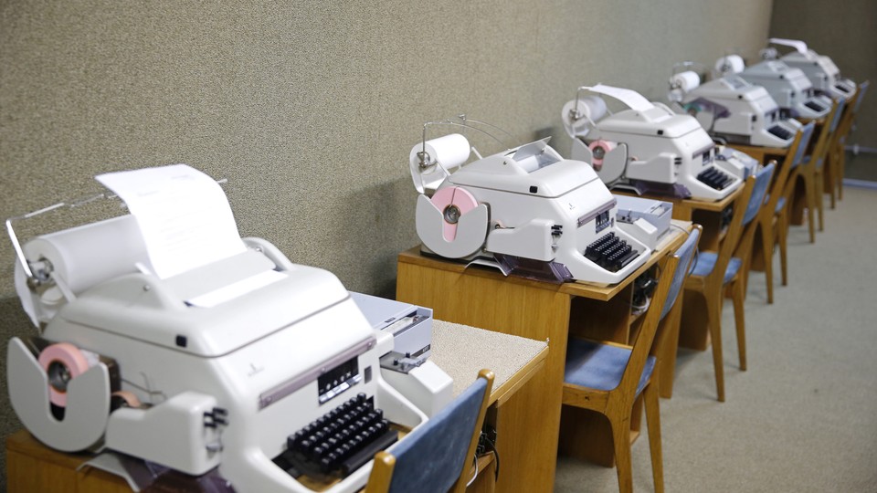 A row of fax machines