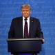 President Donald Trump stands at a podium at the first presidential debate.