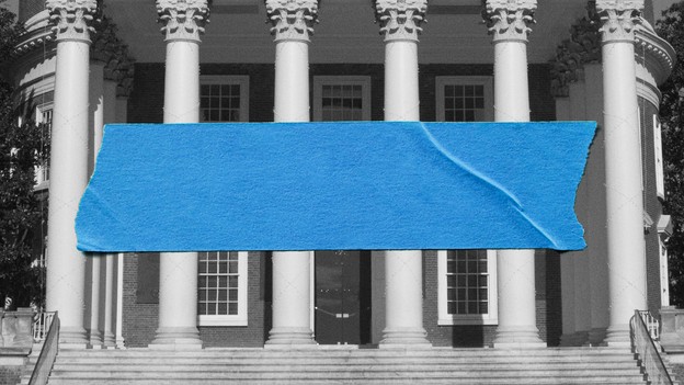 Blue tape over a campus building