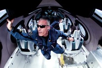A passenger floats in weightlessness on a Virgin Galactic flight to the edge of space