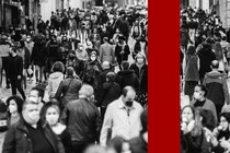 a black and white image of a crowd of people in masks. a vertical red stripe divides the image on the righthand side.