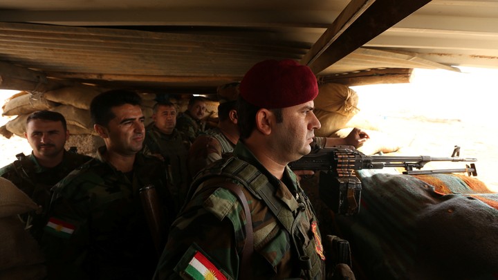 Peshmerga forces gather on the outskirt of Mosul during preparations to attack Mosul, Iraq