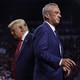 Robert F. Kennedy Jr. walks past Republican presidential nominee Donald Trump during a campaign event