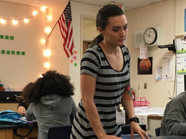 Macie Vega teaches physics at Valley High School; at her prior teaching job in California, she struggled to pay much more than rent on her teacher's salary.