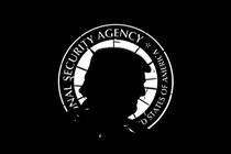 The badge of the National Security Agency with a silhouette of Donald Trump’s head in front of it