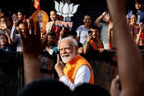 India’s Prime Minister Narendra Modi shows his ink-marked finger after casting his vote.