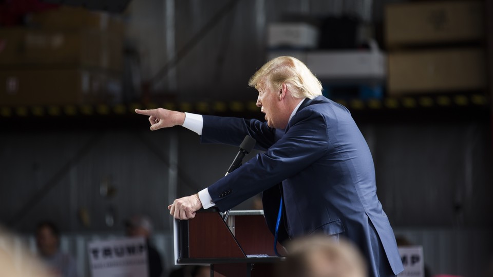 Trump pointing toward an audience