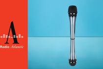Photo of mirrored microphone against blue background, next to the "Radio Atlantic" logo