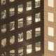 the side of a building with reflective windows