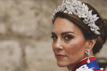 A photograph of Kate Middleton wearing a leafy silver tiara, looking back at the camera over her left shoulder