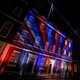 Lights are put on display at 10 Downing Street with the London Eye in the background