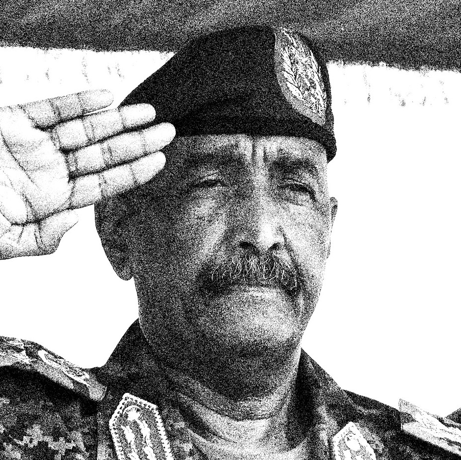black-and-white photo of man with mustache in military uniform and hat saluting