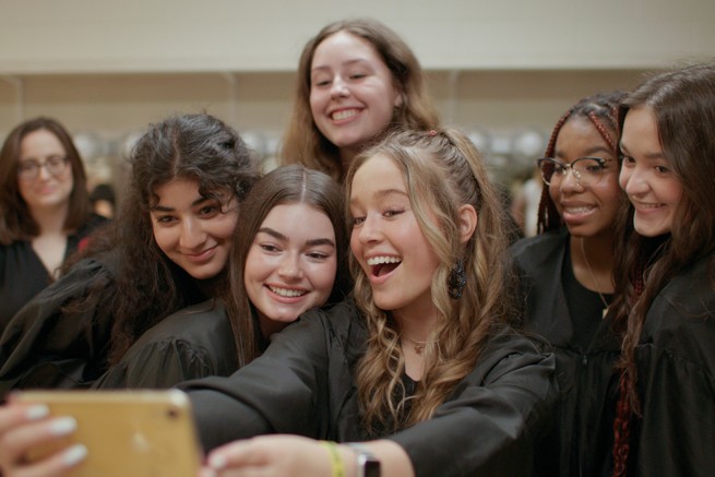 Girls posing in front of a selfie camera