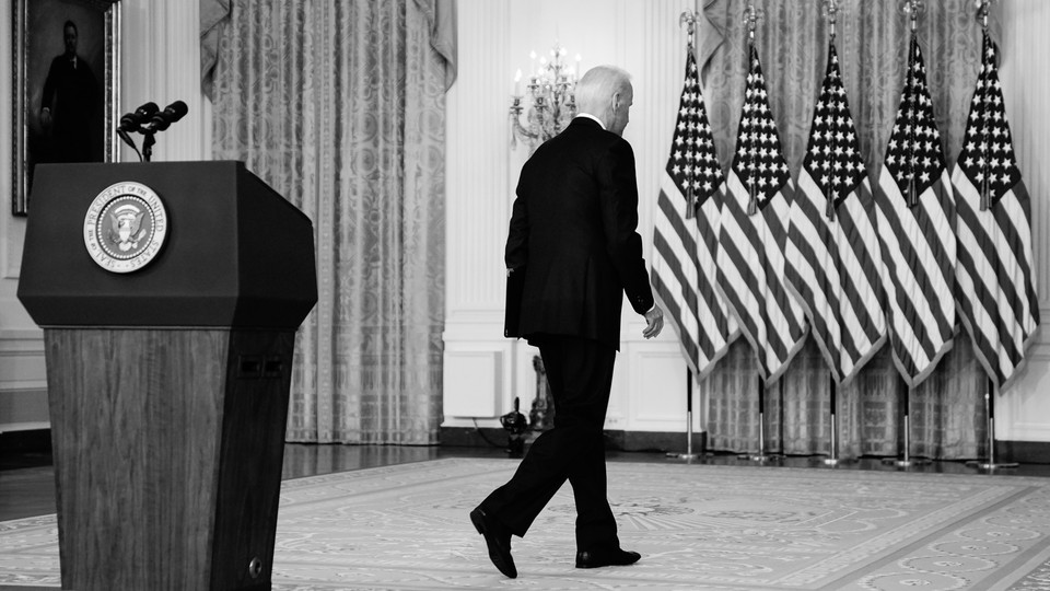 Joe Biden walks from the podium after speaking about Afghanistan from the East Room of the White House, Monday.