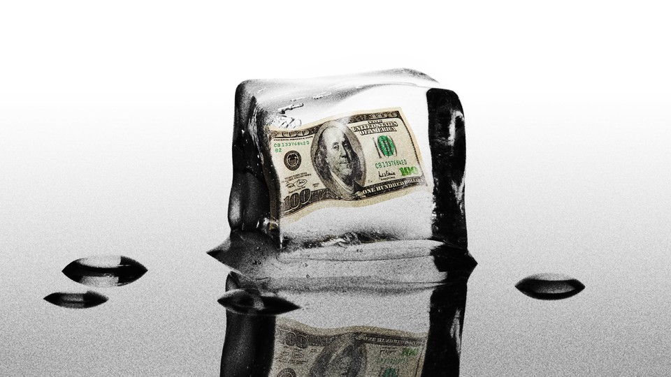 An illustration of a $100 bill inside a melting ice cube