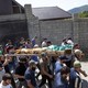 Mourners carry the body of a Chechen dissident in Duisi village, the Pankisi Gorge valley, in Georgia.